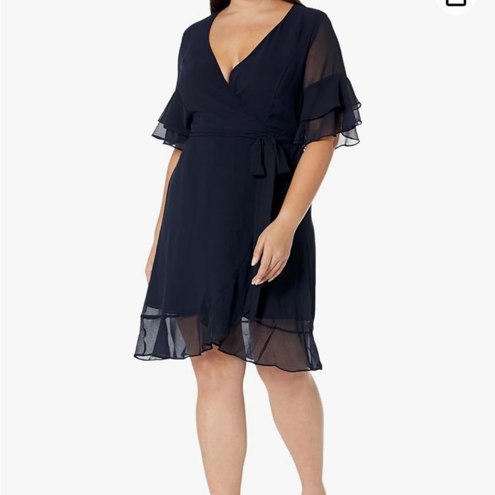 New with beautiful dark bleu city choc dress size L/20 price to sell